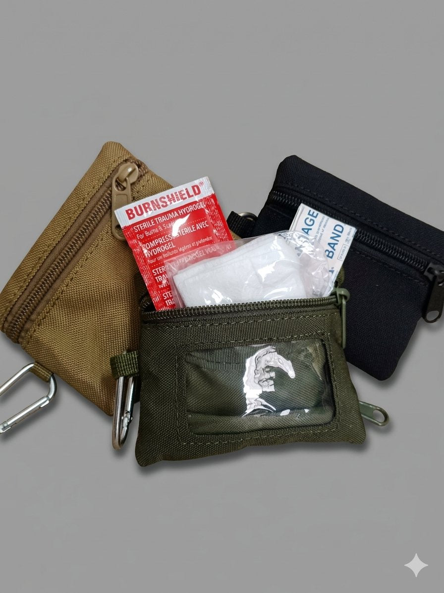 Three GFAK pouches closed showing front ID window and carabiners in Black, Camo and Tan